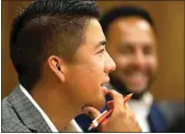  ?? JOHN DONEGAN / THE CALIFORNIA­N ?? With the absence of Ward 3 Councilman Ken Weir, Ward 1 Councilman Eric Arias, left, and Ward 2 Councilman Andrae Gonzales provided questions and compliment­s to officials Tuesday at the Housing and Homeless Committee meeting.