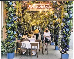  ??  ?? GO FOR IT: The renowned Marea has created an elaborate overhead garden, while Positano in Brooklyn (right) is cozy with a focus still on the Italian fare.