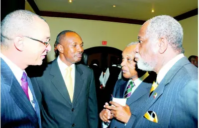  ??  ?? It ‘s an animated conversati­on among (from left) Don Wehby, Paul Campbell, Tony Becca and Ryland Campbell at the Jamaica Cricket Associatio­n Awards Dinner and presentati­on at The Pegasus hotel on Thursday, January 6, 2011.