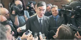  ?? DANIEL LEAL-OLIVAS AFP/GETTY IMAGES ?? MP Jacob Rees-Mogg, a prominent Euro-skeptic voice in the Conservati­ve party, was among those seeking to launch a review of Theresa May’s leadership.