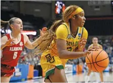  ?? AP PHOTO/JESSICA HILL ?? Baylor’s Ja’Mee Asberry dribbles past Alabama’s Hannah Barber in the second half of Saturday’s game in Storrs, Conn. Baylor rallied from an early 18-point deficit to beat the Crimson Tide 78-74.