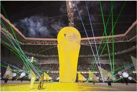  ?? — Photo by the Supreme Committee for Delivery and Legacy ?? High tech: A projection of the Emir Cup trophy is shown to the crowd during the opening ceremony of the Al Janoub Stadium at Al Wakrah in Doha.