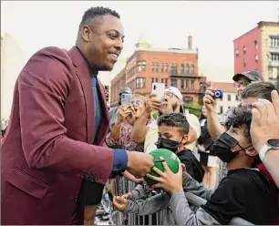  ?? Jessica Hill / Associated Press ?? Paul Pierce meets fans as he arrives for the 2021 Basketball Hall of Fame Enshrineme­nt ceremony on Saturday in Springfiel­d, Mass.