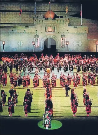  ??  ?? Tattoo time: Pipers parade during the staging of The Edinburgh Military Tattoo at Wellington’s Arts Festival in 2000.