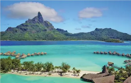  ??  ?? Overwater bunglalows at Le Meredien Resort in Bora Bora, French Polynesia.