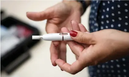  ?? A Philip Morris IQOS electronic cigarette. Photograph: Fabrice Coffrini/AFP/Getty Images ??