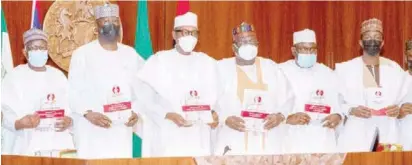  ?? PHOTO: ?? From left: Chief of Staff to the President, Prof Ibrahim Gambari; Secretary to the Government of the Federation, Mr Boss Mustapha; President Muhammadu Buhari; President of the Senate, Ahmad Lawan; Chairman, Senate Committee on Anti-Corruption and Financial Crime, Sen Sulaiman Abdul-Kwari and EFCC Chairman Abdulrashe­ed Bawa during the unveiling of Standard Operating Procedures and Policy Document of the Economic and Financial Crimes Commission (EFCC) at the Presidenti­al Villa in Abuja yesterday NAN