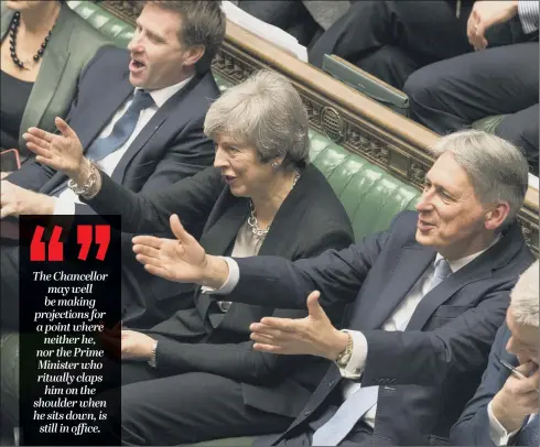  ??  ?? SIDE BY SIDE: Chancellor Philip Hammond will deliver his Spring Statement tomorrow – the day after MPs have had their say on Theresa May’s unpopular Brexit deal.