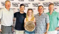  ?? HELEN BLAKE/SPECIAL TO THE GUARDIAN ?? HeadFirst 3 won the spinnaker A class during Charlottet­own Race Week. From left are crew members Bernard (Butch) Postma, Jacob Saunders, Emily Blake, skipper Peter Toombs and John Whynacht. Missing were Jonathan Ross, Dewer MacDougal and junior sailor August Irwin.