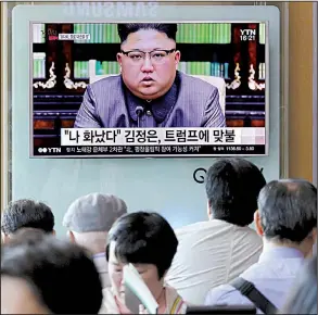  ?? AP/AHN YOUNG-JOON ?? People watch a TV screen Friday in Seoul, South Korea, that shows North Korean leader Kim Jong Un delivering a statement in response to President Donald Trump’s speech to the United Nations. The screen reads “I was angry.”