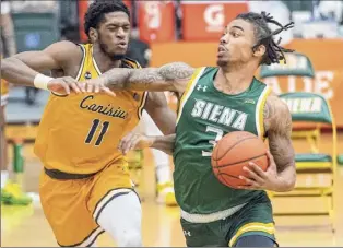  ?? James Franco / Special to the Times Union ?? Siena senior guard Manny Camper averaged 14.1 points, 9.7 rebounds and 3.6 assists to earn Player of the Year in the Metro Atlantic Athletic Conference.