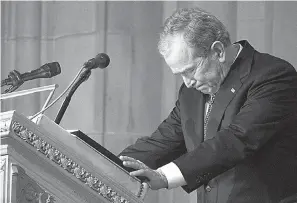  ?? AP Photo/Alex Brandon, Pool ?? ■ Former President George W. Bush becomes emotional Wednesday as he speaks at the state funeral for his father, former President George H.W. Bush, at the National Cathedral in Washington.