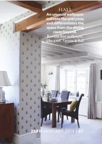  ??  ?? HALL An unusual wallpaper enlivens the entryway and diferentia­tes the space from the dining room beyond. Bumble Bee wallpaper, £89 a roll, Farrow &amp; Ball