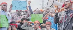  ?? | AFP ?? PROTESTERS call for an end to the fighting between the M23 rebels and the Congolese army in Goma, North Kivu province, in the Democratic Republic of Congo yesterday.