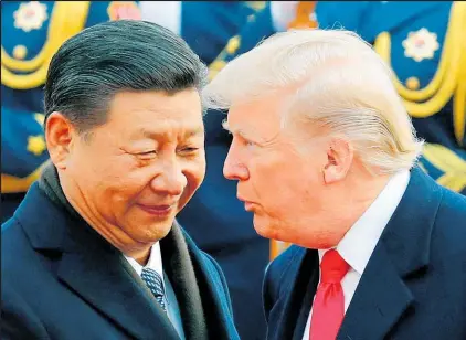  ?? Picture / AP ?? President Xi Jinping, of China (left) hopes to see eye to eye with US counterpar­t Donald Trump on trade.