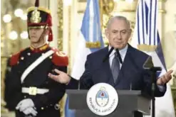  ??  ?? BUENOS AIRES: Israeli Prime Minister Benjamin Netanyahu, right, delivers a speech during a press conference after a working meeting at the Casa Rosada presidenti­al house in Buenos Aires. —AFP