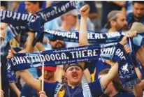  ?? STAFF FILE PHOTO BY DOUG STRICKLAND ?? Chattahool­igans cheer during Chattanoog­a FC’s home opener against the Birmingham Hammers on May 20, 2017.