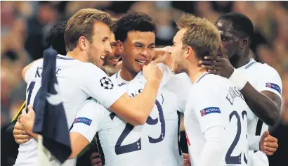  ?? Picture: Reuters ?? BACK IN FORM. Tottenham’s Dele Alli (centre) celebrates with team-mates after scoring their second goal against Real Madrid at Wembley on Wednesday.