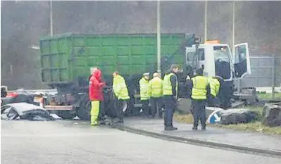  ??  ?? South Wales Police at the scene of the collision on the A472