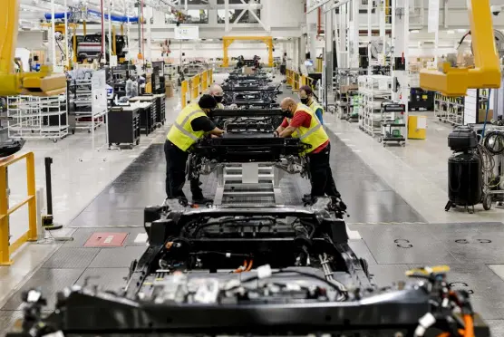  ?? Lyndon French, © The New York Times Co. ?? Electric truck maker Rivian, with an assembly line in Normal, Ill., said on Friday that it was planning to sell shares through an initial public offering.
