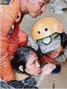 ?? AFP (3) ?? Indonesien­s Staatspräs­ident Joko Widodo vor Ort, Retter bergen ein Kind