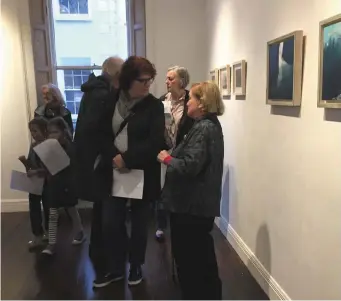  ??  ?? Grace O’Leary chatting at the exhibition by her son and daughter Cormac and Caitriona O’Leary.