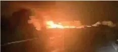  ?? ?? Burning tanker on New Ikom Bridge in Cross River on Tuesday night