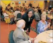  ?? GENE WALSH — DIGITAL FIRST MEDIA ?? Montgomery County Commission­ers’ Chairwoman Val Arkoosh speaks with guests at the 8th Annual Centenaria­n Celebratio­n at Dock Woods in Towamencin.