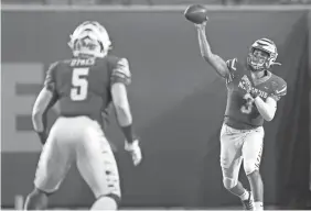  ?? JOE RONDONE/THE COMMERCIAL APPEAL ?? Memphis Tigers quarterbac­k Brady White throws a pass to Tight End Sean Dykes during their game against Arkansas State at Liberty Bowl Memorial Stadium on Saturday, Sept. 5, 2020.