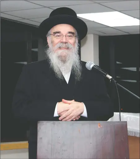  ?? (Courtesy Photo/Joel Friedman) ?? Rabbi Avrohom Pinter makes a speech at Canvey Island, in Essex, southeast England. When the British government ordered a lockdown to slow the spread of coronaviru­s, Pinter went door-to-door to deliver the public health warning to the ultra-Orthodox Jews in northeast London.