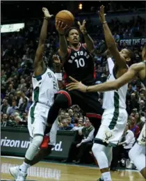  ?? DYLAN BUELL, GETTY IMAGES ?? DeMar DeRozan had 32 points on 12-of-24 shooting, along with five steals against the Milwaukee Bucks Thursday.