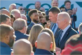  ?? KARL MERTON FERRON/BALTIMORE SUN PHOTOS ?? Baltimore Mayor Brandon Scott is among attendees at Monday’s news conference at Penn Station with Biden.
