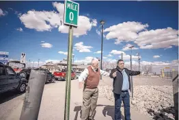  ??  ?? Bill Mattiace, left, of the New Mexico Border Authority, and Sergio Romero, a business owner in Palomas, discuss plans for the new $85 million port of entry, with constructi­on to begin in April. Business leaders on both sides of the border founded the...