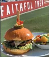  ?? COURTESY MARIO BEABRAUT ?? At Michael Mina’s Bourbon Pub at Levi’s Stadium, executive chef Mario Beabraut’s turkey burgers come topped with guacamole and mizuna and tucked into a toasted brioche bun.