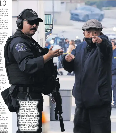  ?? Picture: REUTERS ?? A man signals as a police officer directs him to walk away from the location of a shooting that took place during a Chinese Lunar New Year celebratio­n, in Monterey Park, California, US January 22, 2023.