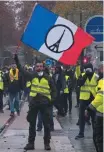  ?? GUILLAUME SOUVANT/AFP ?? Caos. ‘Coletes amarelos’ protestam em Paris
