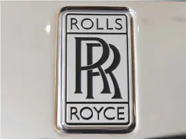  ?? Picture: EPA ?? FLYING LOW. A Rolls Royce logo seen at the jet engine makers showroom in London, Britain.