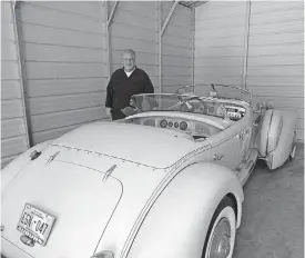  ?? [PHOTO PROVIDED] ?? Doug Pray stands next to the last vehicle built in 1981 which he designed for his father, Glenn Pray.