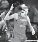  ?? PATRICK SEMANSKY/AP ?? Mystics forward Elena Delle Donne scored 22 points to give Washington a 1-0 series lead against Connecticu­t.