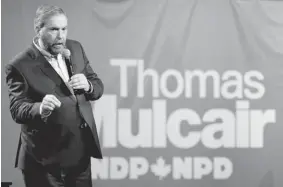  ?? PAUL CHIASSON/ THE CANADIAN PRESS ?? NDP Leader Tom Mulcair took on policy questions in an unscripted town-hall session during the party’s three-day policy convention in Montreal.