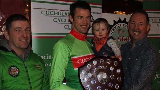  ??  ?? Pictured at the Cuchulainn CC NYE timetrail presentati­on are Ray Redigan (Bike Station), winner Liam Dolan winner with his daughter Lucy and Sé Weston (club chairman).