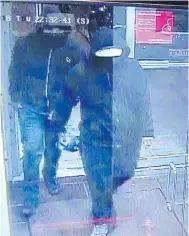  ?? THE CANADIAN PRESS / HO / PEEL REGIONAL POLICE ?? Police are searching for these two males caught on camera leaving the scene of a restaurant explosion.