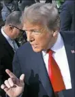  ?? Evan Vucci/Associated Press ?? President Donald Trump speaks to reporters Friday on the North Lawn of the White House.