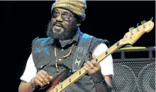  ?? MATT SMITH/AP FILES ?? Wailers bassist Aston Barrett performs during a free Memorial Day outdoor festival in Bethlehem, Pa. Former members of Jamaican reggae band, The Wailers, that played alongside Bob Marley are going to court to try to stop the group they left from...