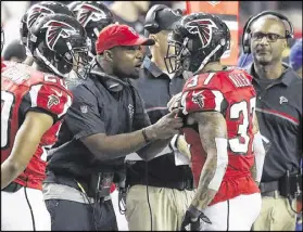  ?? KEVIN TERRELL / ASSOCIATED PRESS ?? After serving as Atlanta’s secondary coach for two seasons, Marquand Manuel (center), talking to safety Ricardo Allen (right), ascends to defensive coordinato­r.