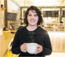  ?? ERROL MCGIHON ?? Bread By Us co-owner Jessica Carpinone says a suspended coffee will be given to a future customer who needs it.