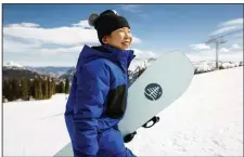  ?? (AP/Burton Snowboards/Jesse Dawson) ?? Patti Zhou, 11, who was born in Beijing but lives in Colorado, could be the next big thing in the halfpipe and slopestyle. She makes her Dew Tour debut this weekend in Copper Mountain, Colo.