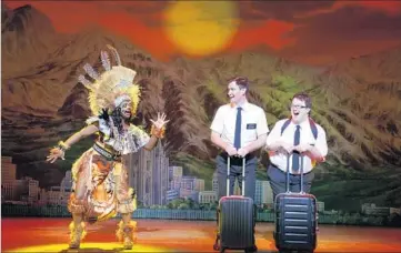  ?? Joan Marcus ?? THE ELDERS of “The Book of Mormon” continue their missionary work as the musical returns on tour.