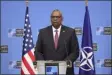  ?? OLIVIER MATTHYS — THE ASSOCIATED PRESS ?? United States Secretary of Defense Lloyd Austin reads a statement following a NATO defense ministers meeting at NATO headquarte­rs in Brussels, Wednesday.