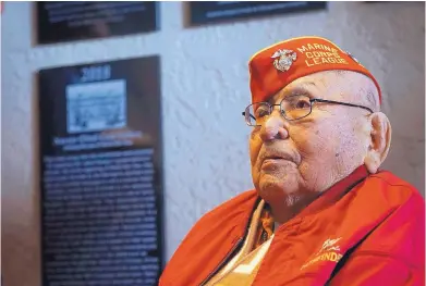  ?? ADOLPHE PIERRE-LOUIS/JOURNAL ?? Navajo Code Talker Joe Vandever Sr., 95, of Haystack, is seen with a plaque after the group of World War II heroes was inducted to the Albuquerqu­e Wall of Fame. The ceremony was held at the Alvarado Transporta­tion Center on Friday.